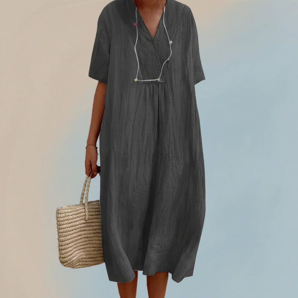 Soft, easy-care women's flowy summer midi dress, a comfortable V-neck A-line for daily wear or travel.