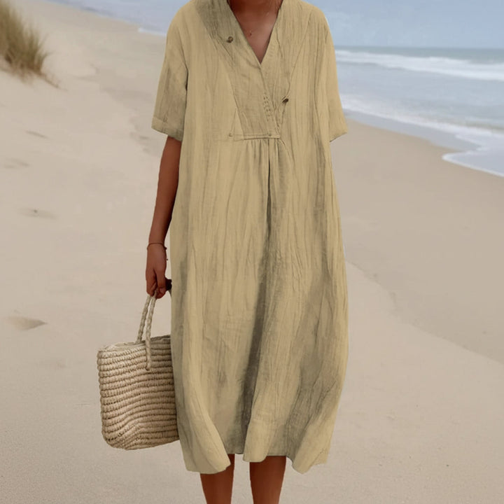 Versatile women's flowy midi dress, easily styled from casual to elegant for any summer occasion.