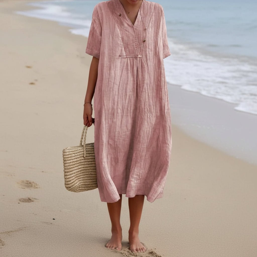 Chic women's flowy summer V-neck A-line dress, combining comfort and effortless style for warm days.