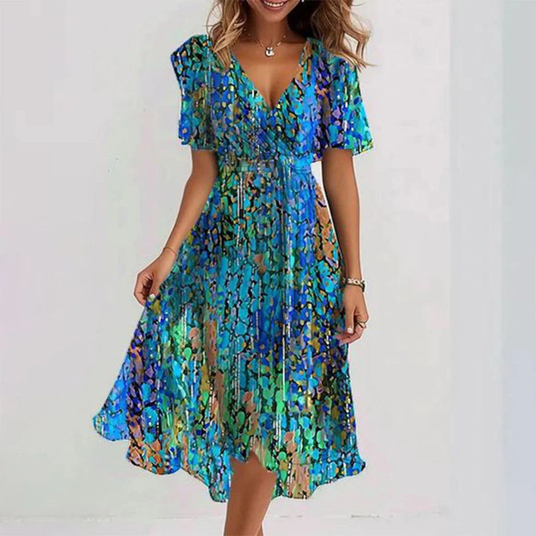 Casual women's flowy summer dress in a lightweight midi style. Sleeveless and versatile for warm weather & vacation.