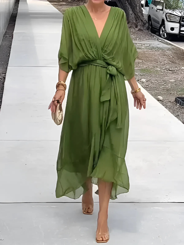 Women's flowy V-neck belted maxi dress, perfect for elegant casual wear or a stylish vacation outfit.