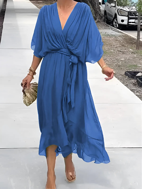 Comfortable women's flowy V-neck maxi dress with belt, ideal for versatile spring and summer fashion.