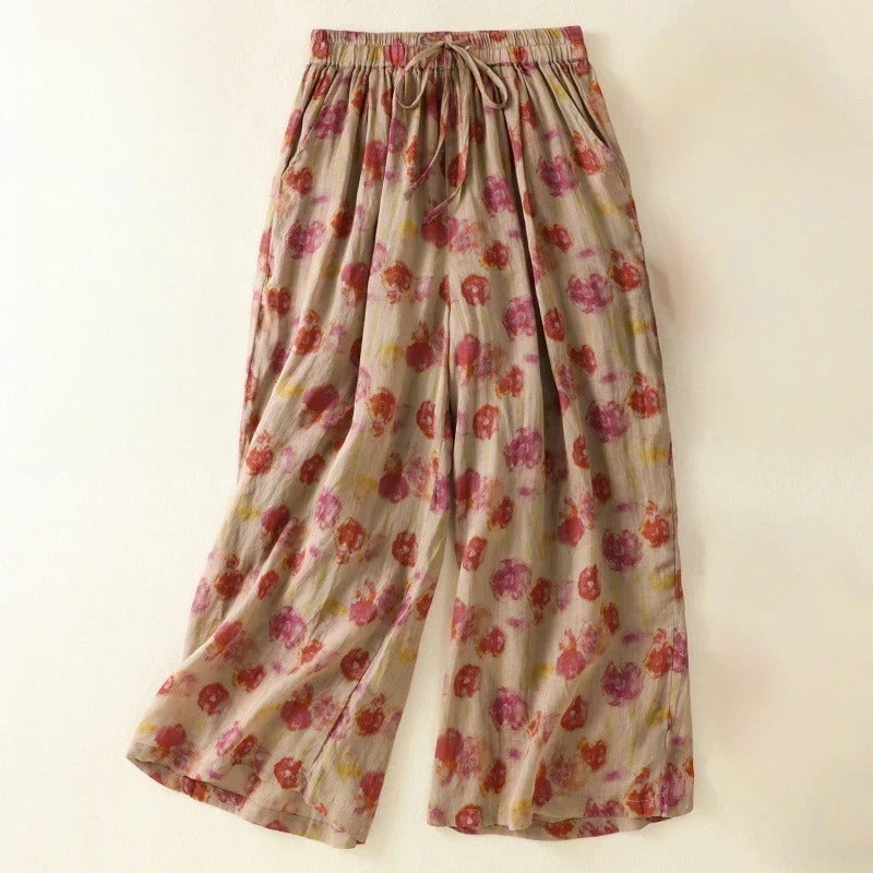 Women's flowy wide-leg comfort pants with high waist & tie detail, perfect for elegant casual summer style.