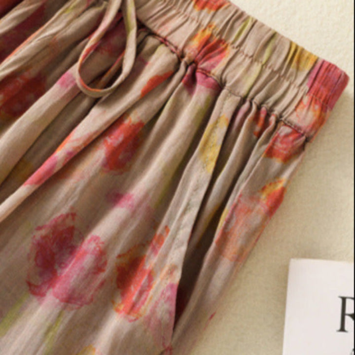 Elegant women's high-waisted wide-leg flowy pants with tie detail, offering comfort & versatile summer casual wear.