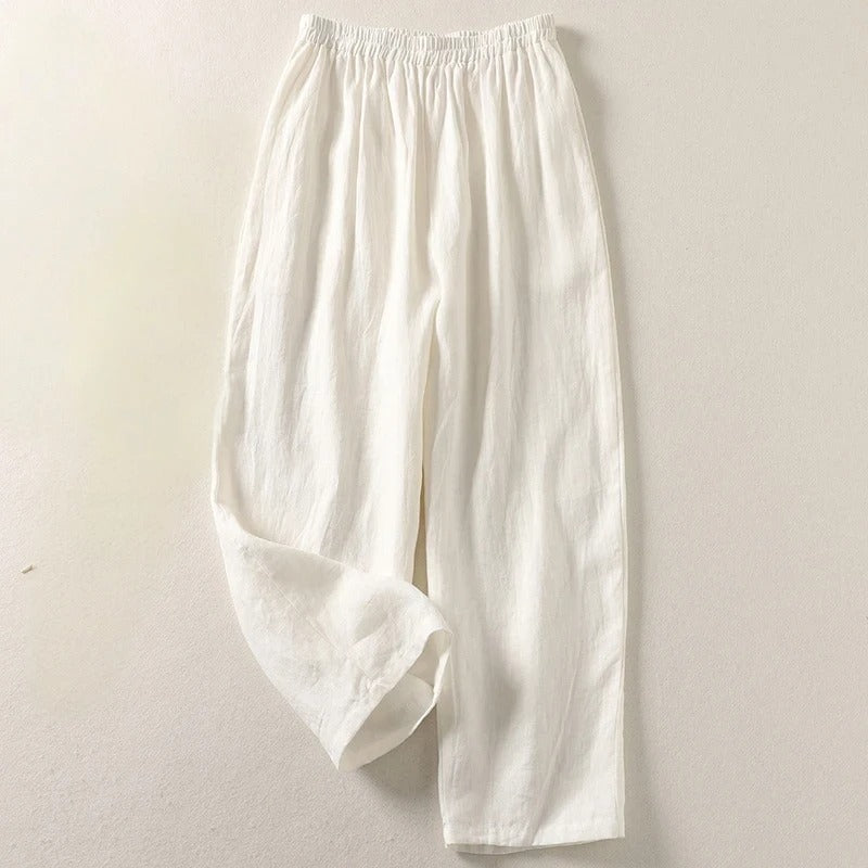 Chic women's flowy wide-leg pants, offering a comfortable & versatile look for casual wear or vacation style.