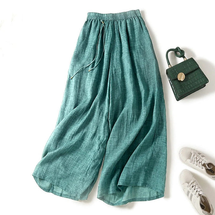 Women's flowy wide-leg pants in a relaxed fit. Perfect for effortless summer style, beach, or vacation. Comfortable & breezy.