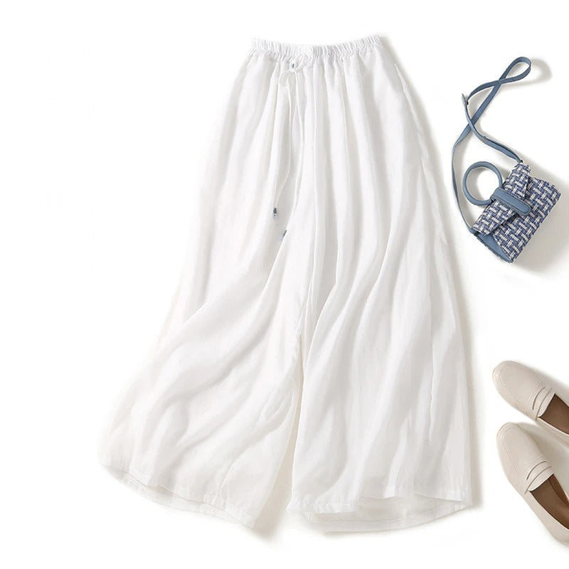 Elegant women's wide-leg flowy pants for spring & summer. Ideal for casual, comfortable, and stylish warm-weather outfits.
