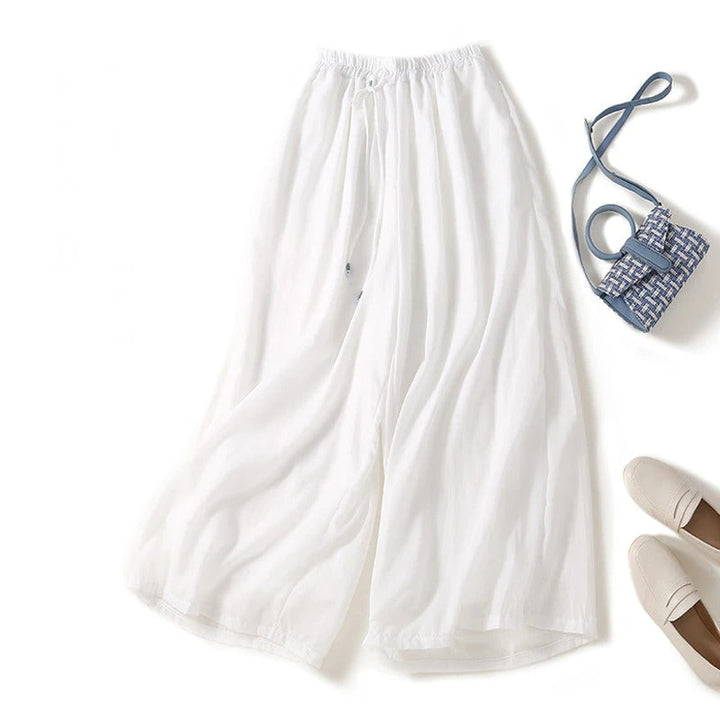 Elegant women's wide-leg flowy pants for spring & summer. Ideal for casual, comfortable, and stylish warm-weather outfits.