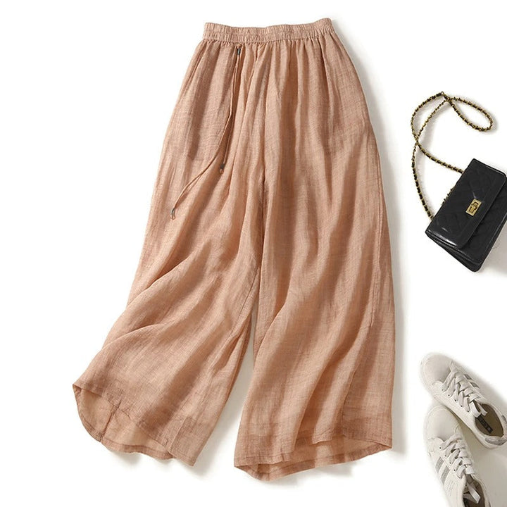Breezy women's flowy wide-leg pants, offering a relaxed fit. Excellent for beach days, vacation, or comfortable casual wear.