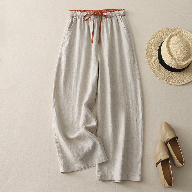 Women's flowy wide-leg pants in black, perfect for a comfortable, relaxed fit casual summer or vacation style.
