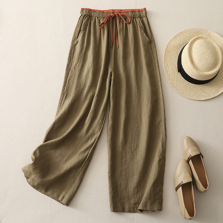 Khaki flowy wide-leg women's pants, versatile for casual wear, summer vacations, and effortless spring outfits.