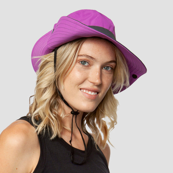 Wide brim women's sun hat, foldable & breathable, offering UPF 50+ UV protection for all summer adventures.