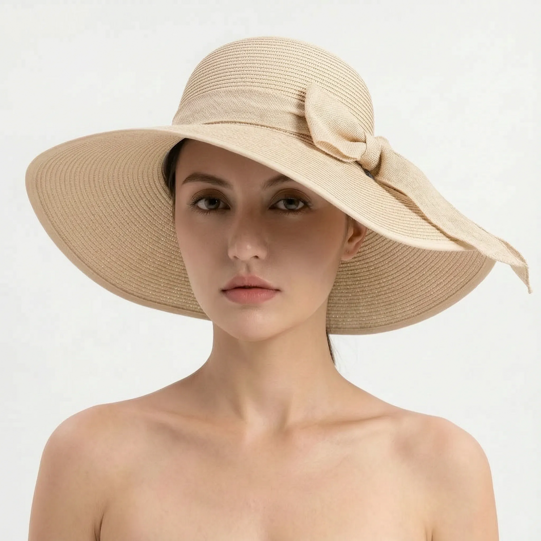 Enjoy the sun safely with this women's foldable wide brim sun hat, perfect for any vacation.