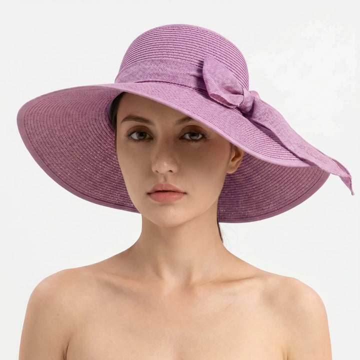 Packable wide brim women's sun hat. Perfect foldable travel hat for beach, vacation & summer adventures.