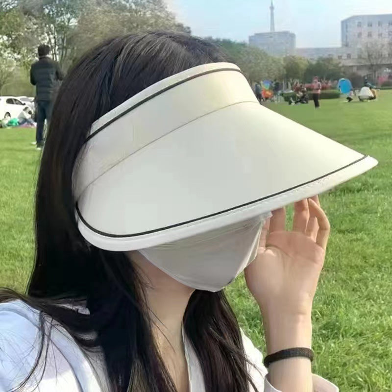 Elegant women's FoldSun Pro roll-up visor hat, UV protection, perfect summer accessory