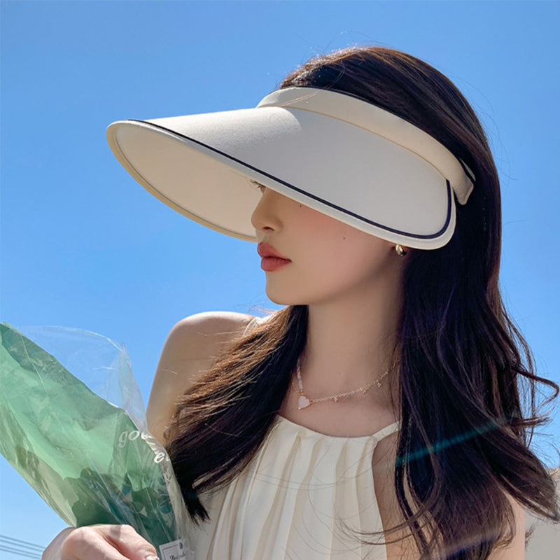 Stylish women's sun hat, FoldSun Pro roll-up visor with UV sun protection, perfect for travel