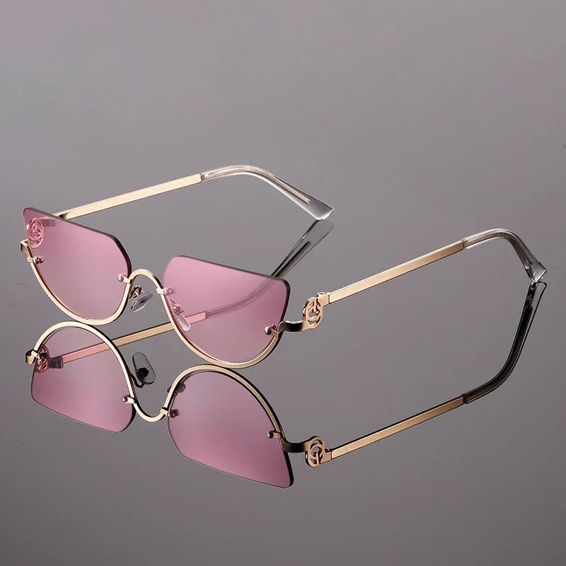 Statement women's frameless angular sunglasses, perfect summer accessory with UV protection & modern bold style.