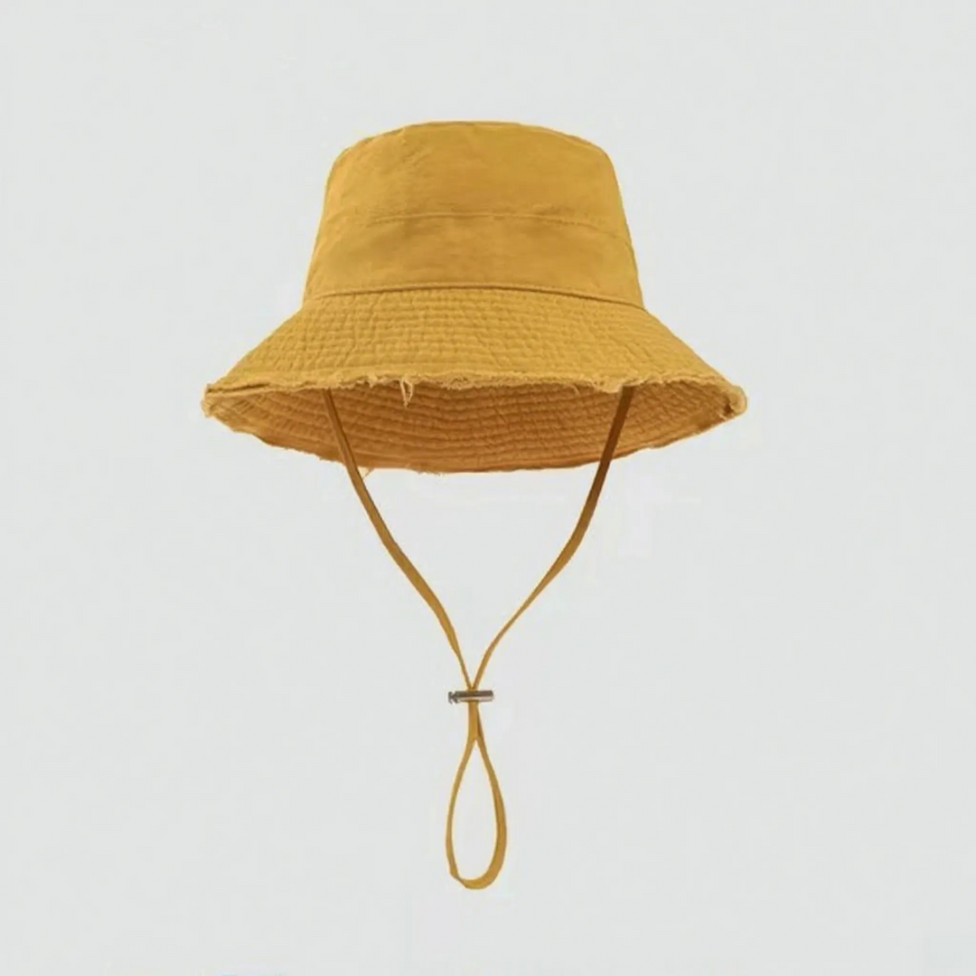 Versatile women's frayed brim summer hat. Offers sun protection and relaxed style for beach or travel.