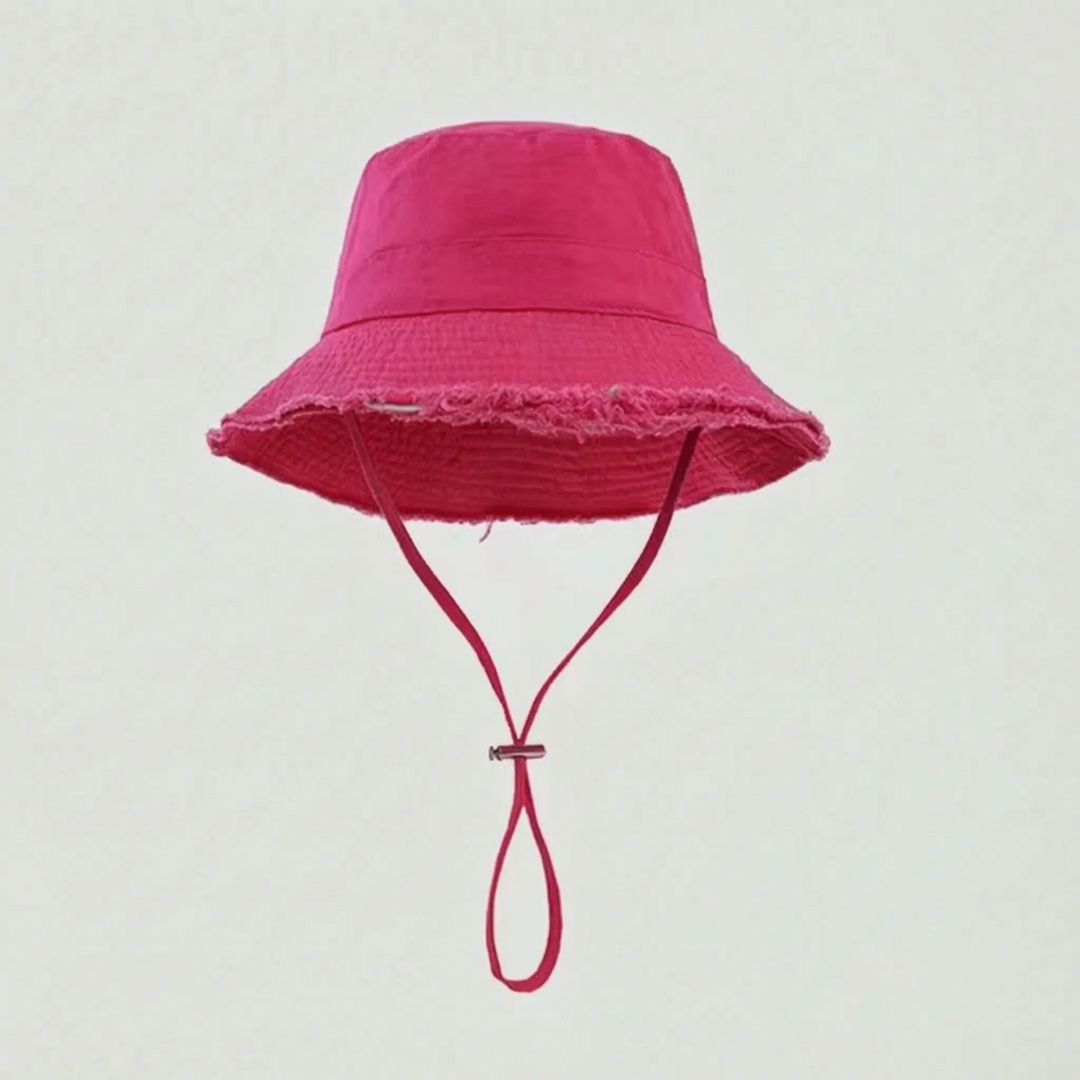 Casual women's sun hat with a unique frayed brim design. Essential summer accessory for beach & travel.