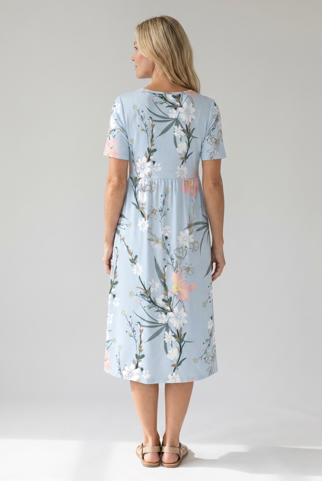 Women's floral A-line midi dress. Round neck, short sleeve, casual summer wear. Fresh, elegant, versatile.