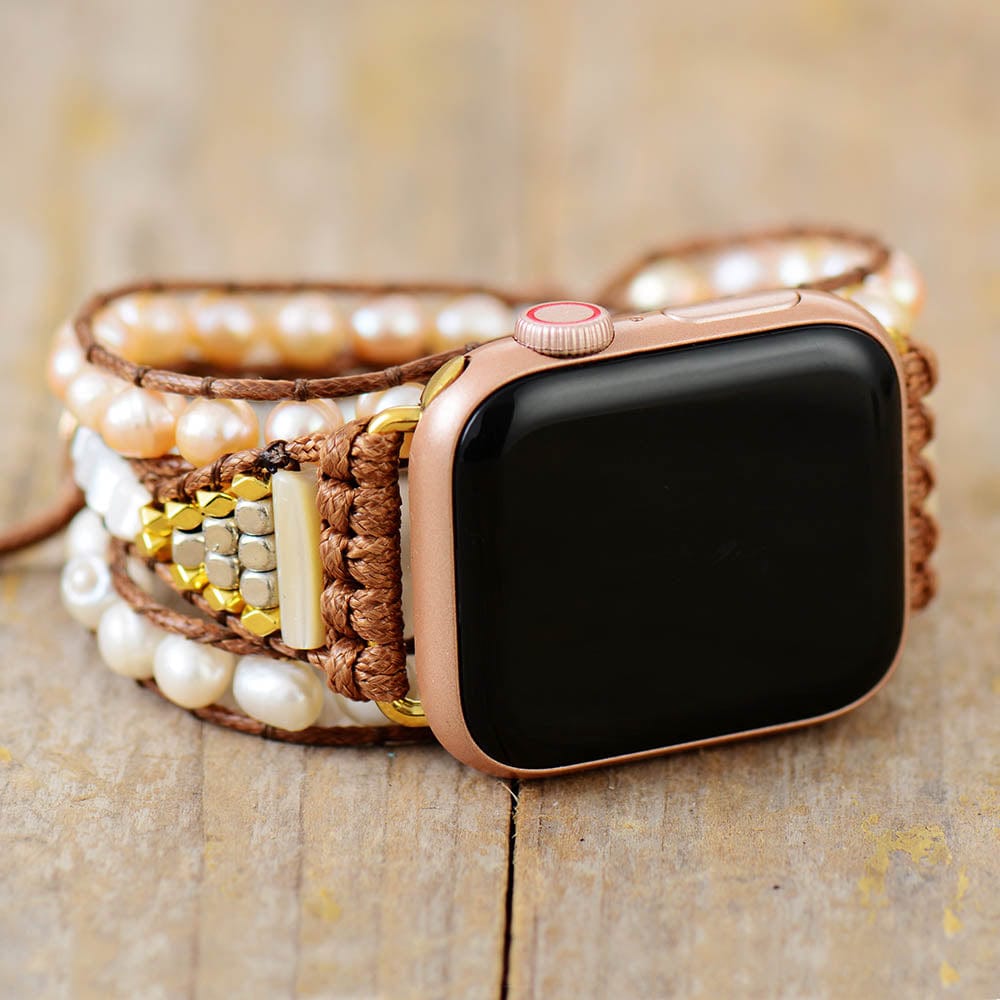 Women's freshwater pearl Apple Watch wrap band, handmade for elegant boho style.
