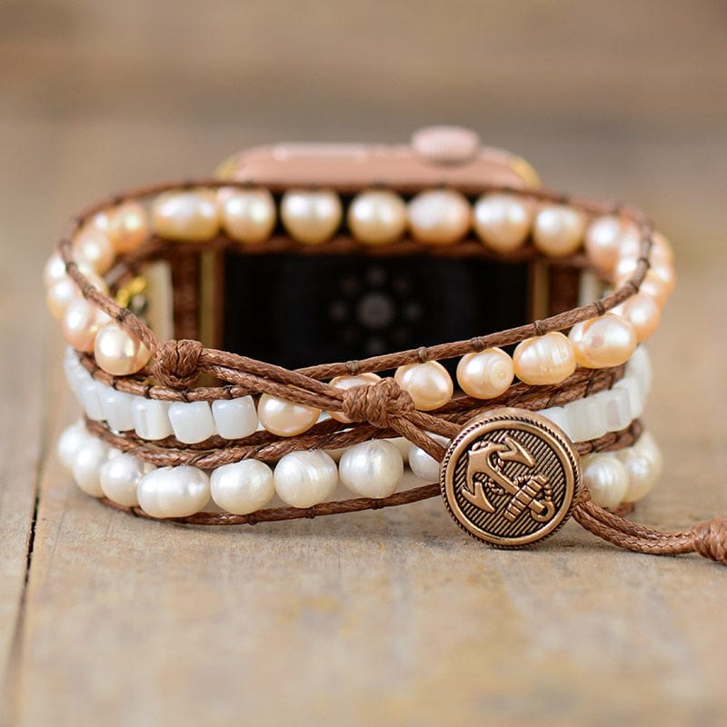 Boho-chic women's Apple Watch strap featuring genuine freshwater pearls, a unique wrap-around design.