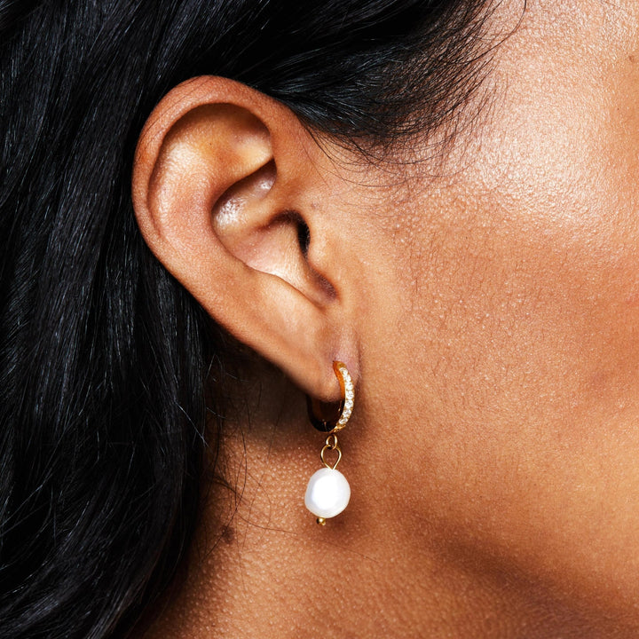 Women's freshwater pearl hoop earrings, elegant daily wear jewelry.
