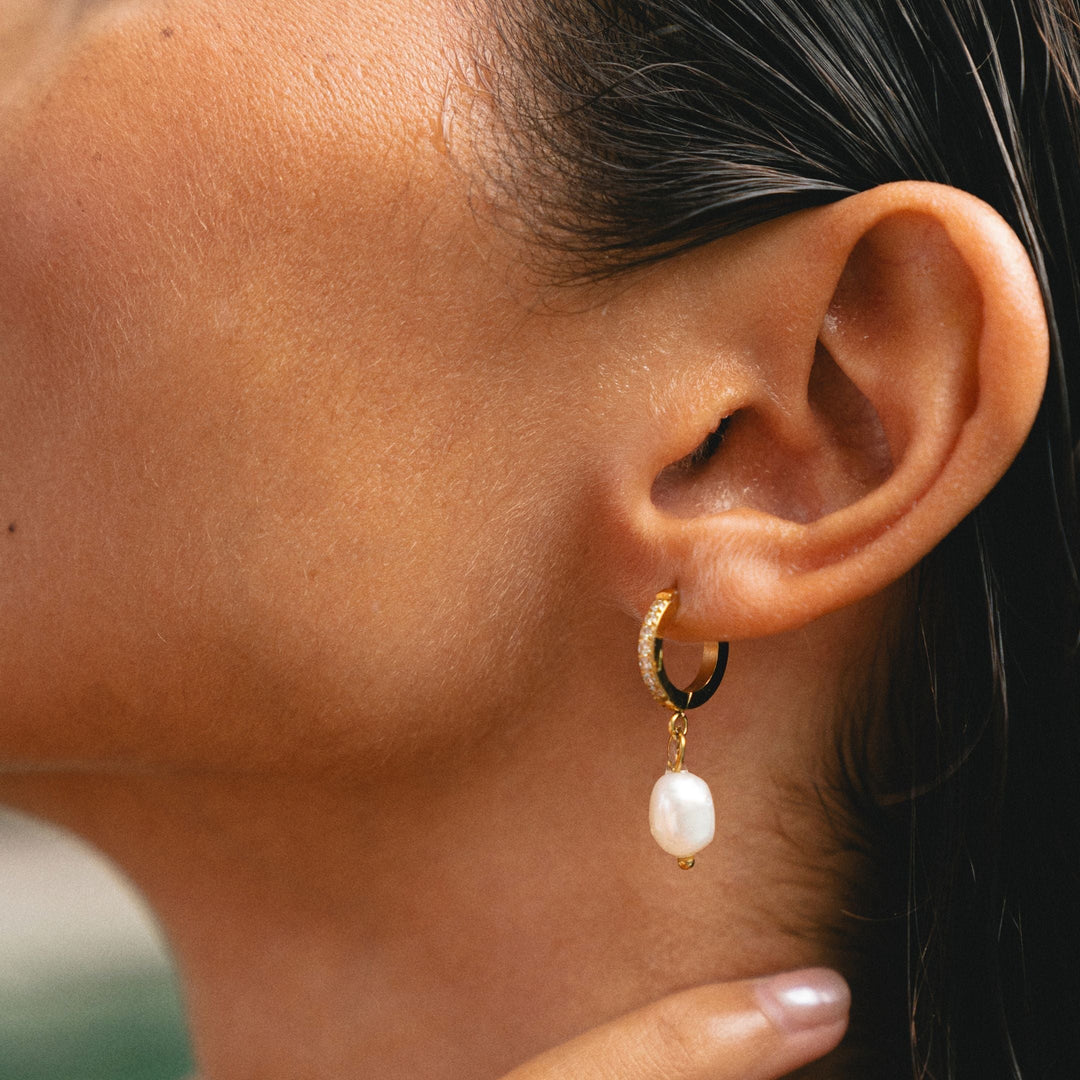 Silver freshwater pearl hoop dangle earrings, hypoallergenic & elegant.