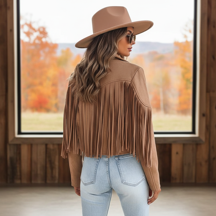 Women's fringed western style faux leather jacket in brown, front view with long fringe