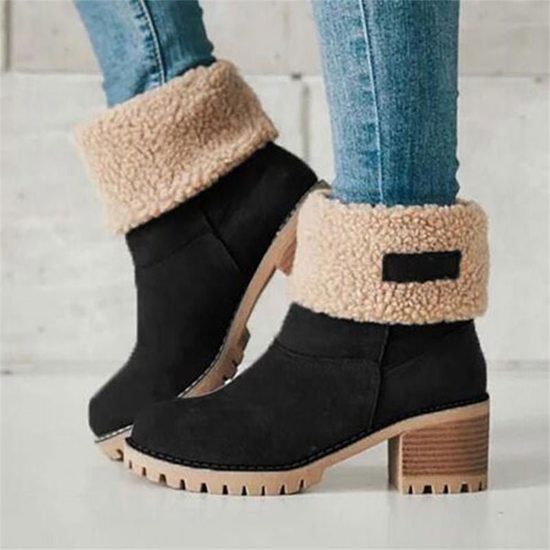 Women's FrostStep insulated winter ankle boots with heel. Perfect cold weather fashion footwear.