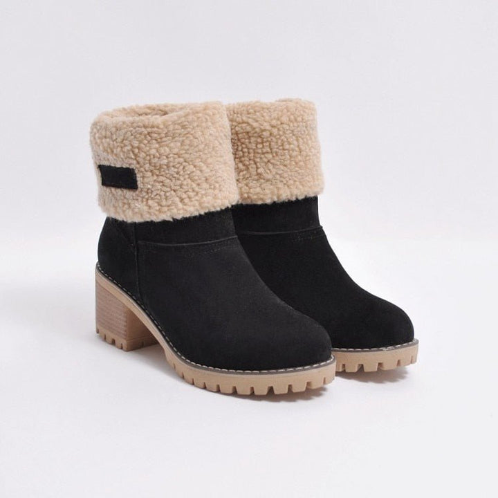 Stylish women's FrostStep heeled ankle boots. Fashion-forward insulated winter footwear for cold weather.