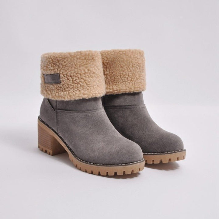 Walk in style with women's FrostStep insulated winter ankle boots. Perfect heeled boots for snowy, cold days.