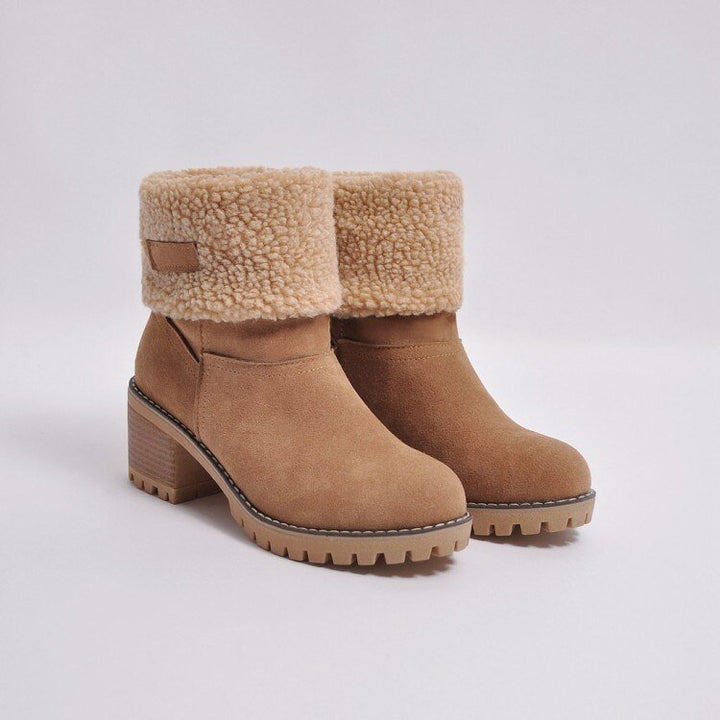 Sleek women's FrostStep ankle boots, insulated with a chic heel. A seasonal fashion essential for cold weather.