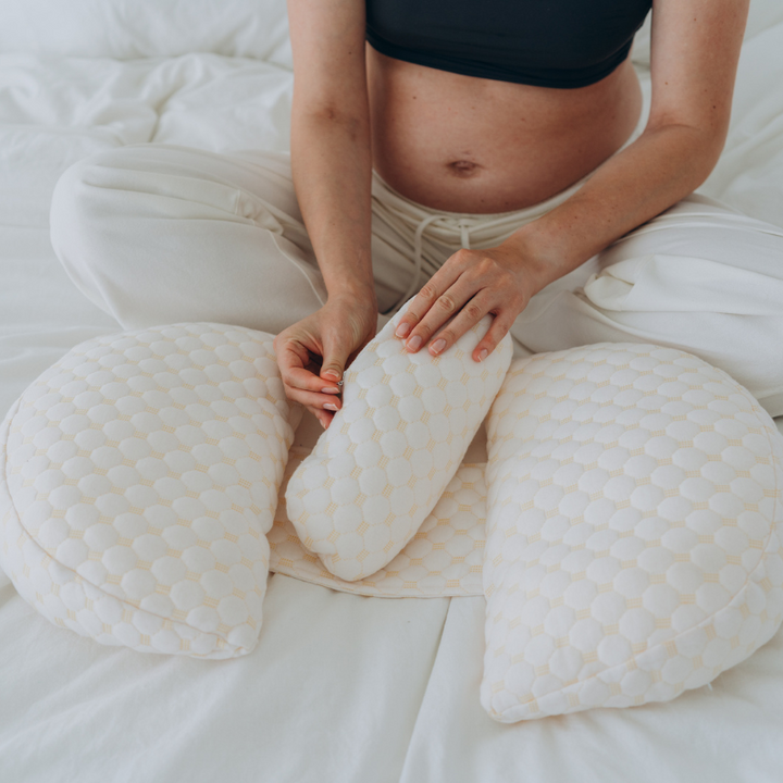 Comfortable pregnancy pillow for women, designed to support expecting mothers for better sleep and relaxation.