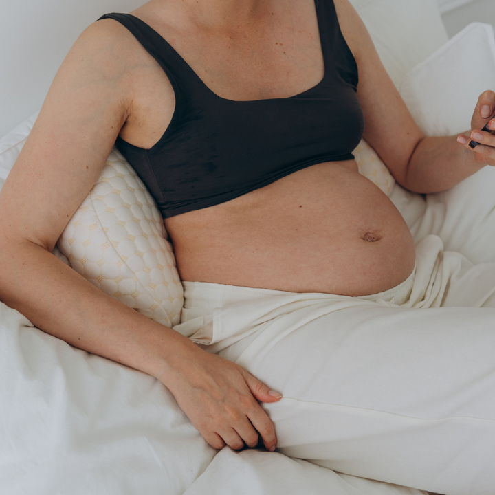 Deluxe women's full body pregnancy support pillow, designed for maximum comfort and sleep quality for mothers-to-be.
