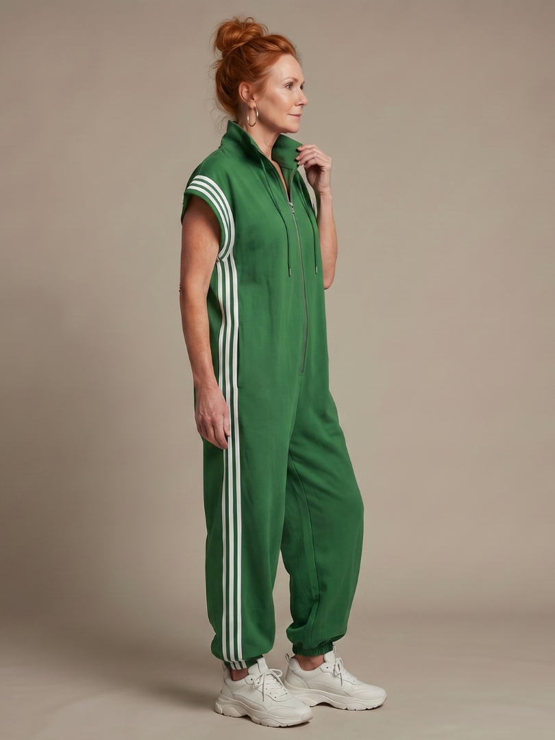 Modern full-length women's jumpsuit with a zip front, cap sleeves, and athletic side stripe design.