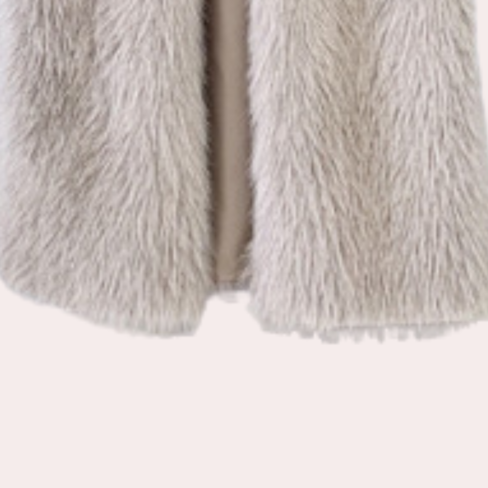 Stylish women's long winter coat. Warm Gariela teddy jacket, cozy outerwear for cold weather fashion.