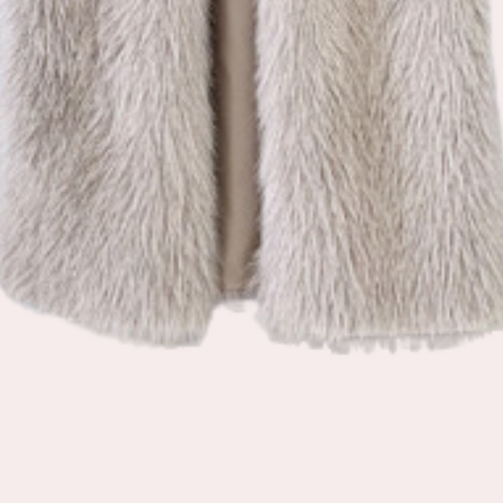 Stylish women's long winter coat. Warm Gariela teddy jacket, cozy outerwear for cold weather fashion.