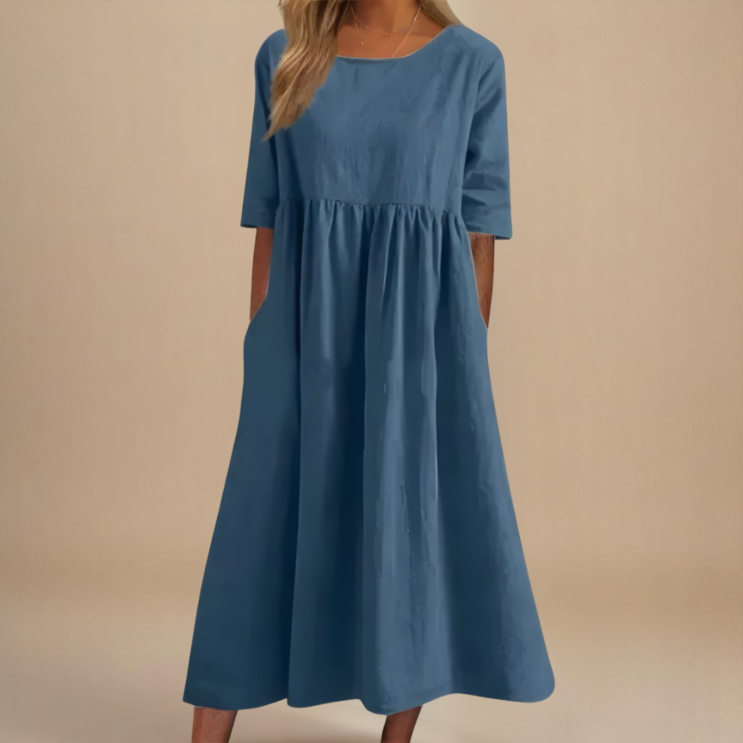 Modest women's midi dress, half-sleeve with a flattering gathered waist, ideal for effortless daily fashion.