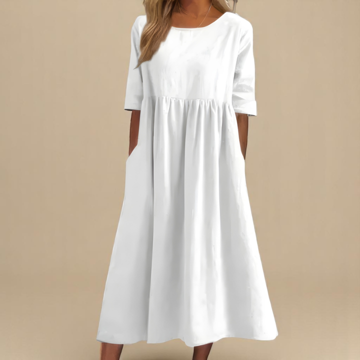 Stylish women's half-sleeve midi dress with an elegant gathered waist, perfect for warm weather fashion.