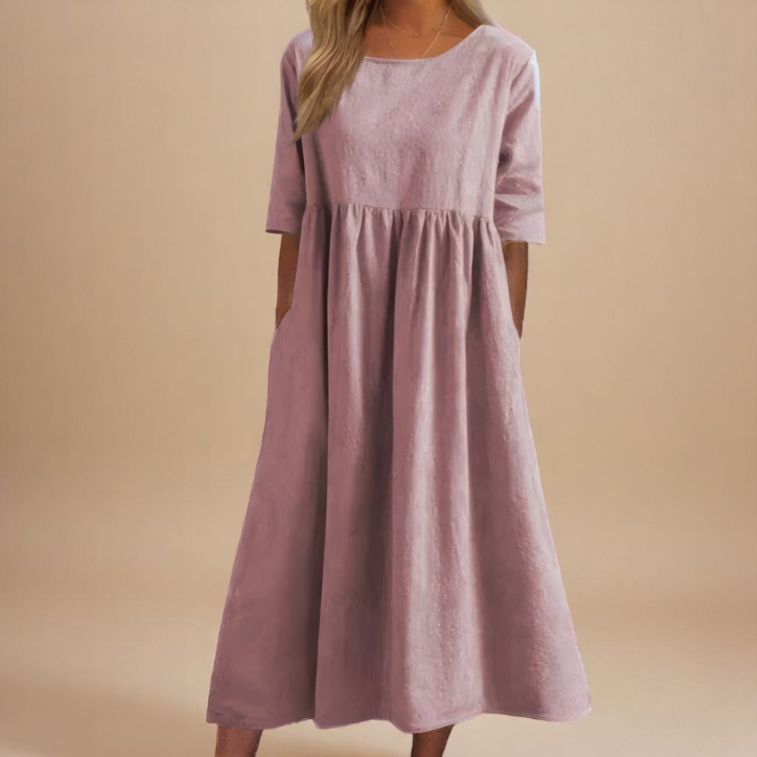 Versatile half-sleeve midi dress for women, featuring a flattering gathered waist and flowy silhouette.