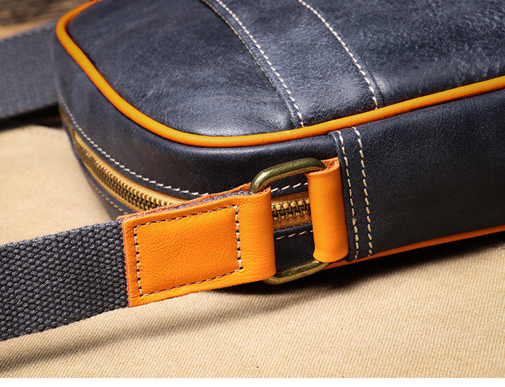 Blue genuine leather crossbody bag for women, stylish and compact with a practical adjustable strap.