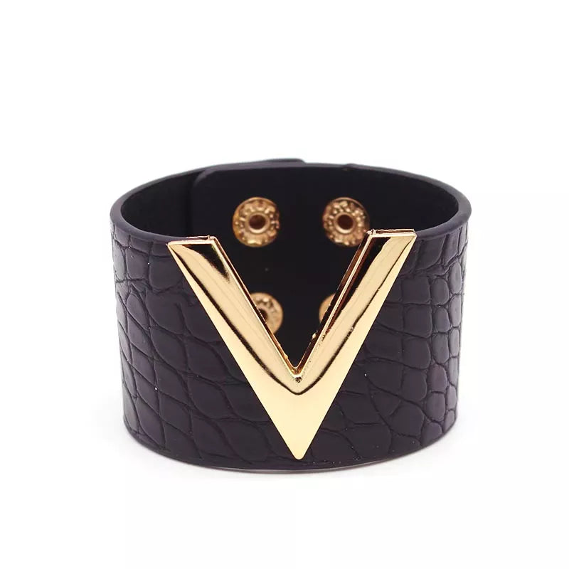 Women's genuine wide leather wrap bracelet, adjustable cuff for a stylish statement. Perfect fashion accessory.