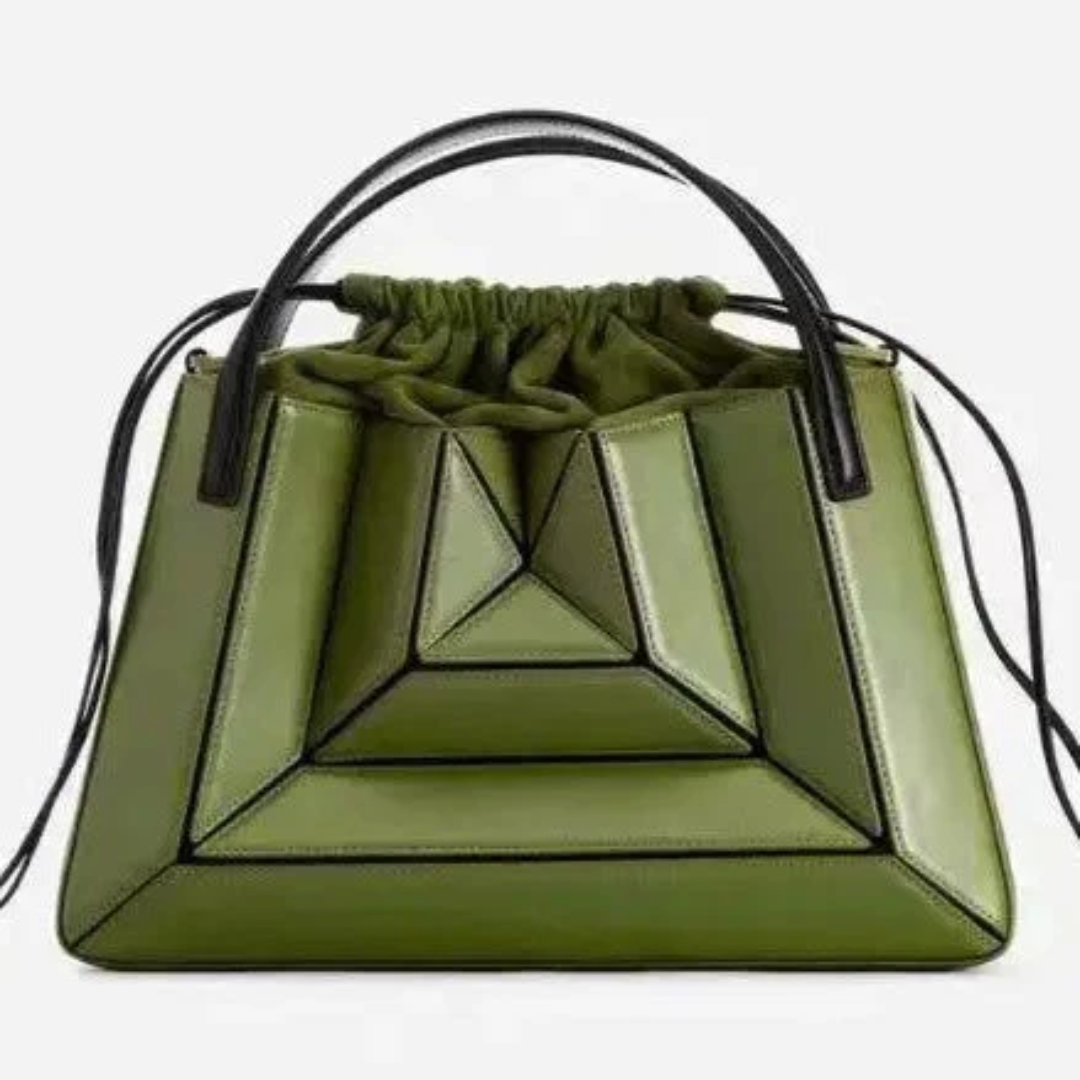 Chic women's shoulder bag featuring a unique geometric design. Modern fashion purse.