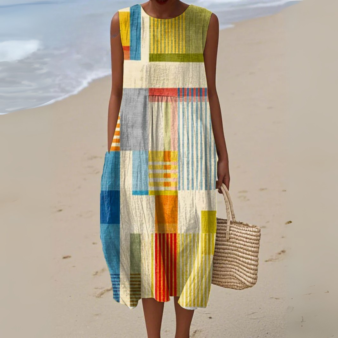 Women's geometric patchwork midi dress, sleeveless & relaxed fit. Ideal for summer casual & bohemian style.