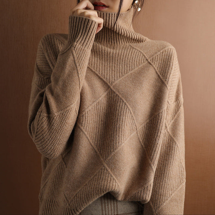 Chic women's sweater, geometric texture, high neck design, and ribbed cuffs for a snug fit.
