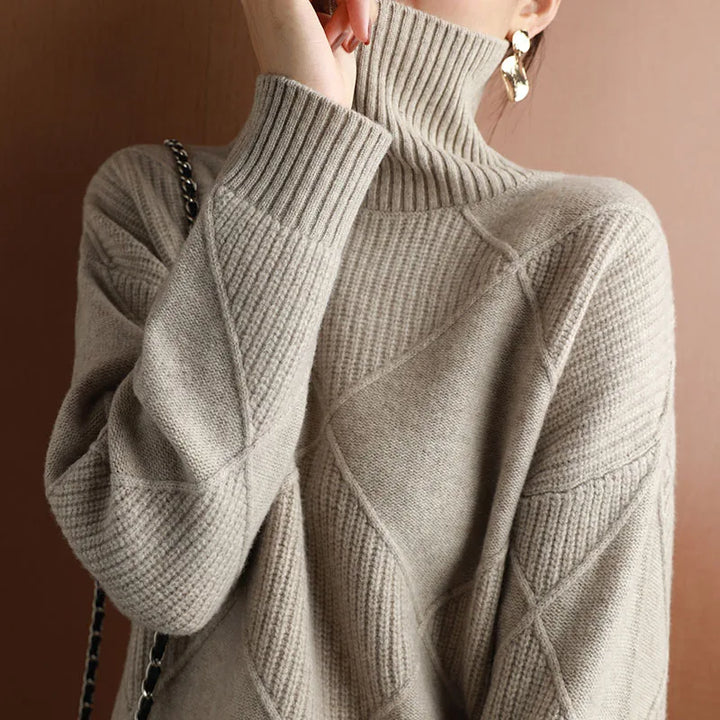 Elegant women's high neck sweater with a sophisticated geometric texture, autumn fashion.