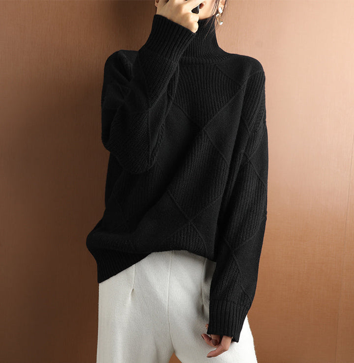 Women's fashion sweater, high neck, geometric pattern, and ribbed cuffs, ideal for layering.