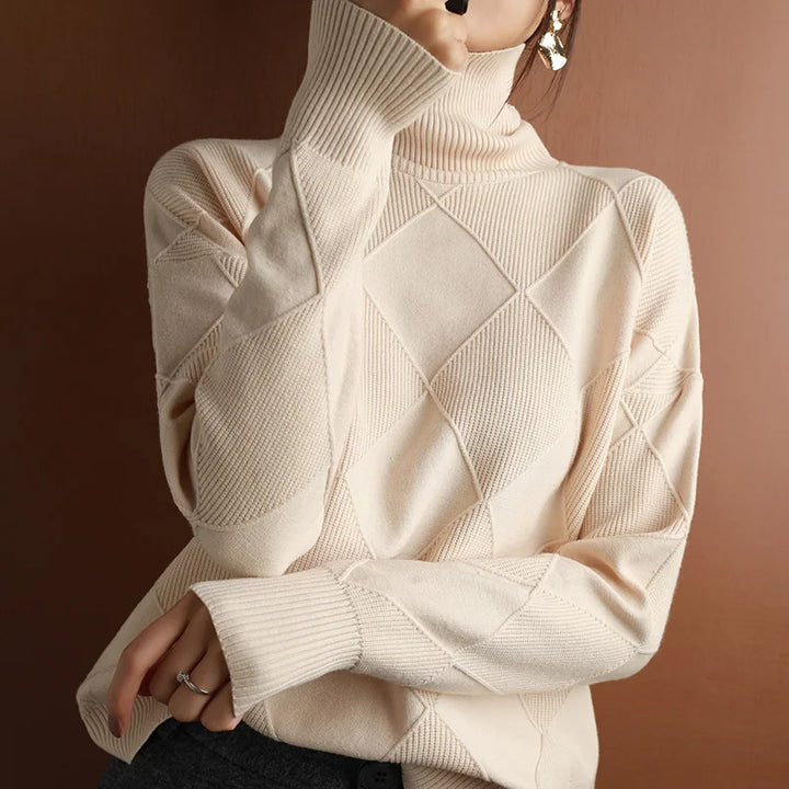 Versatile women's geometric texture high neck sweater, a cozy and fashionable autumn staple.