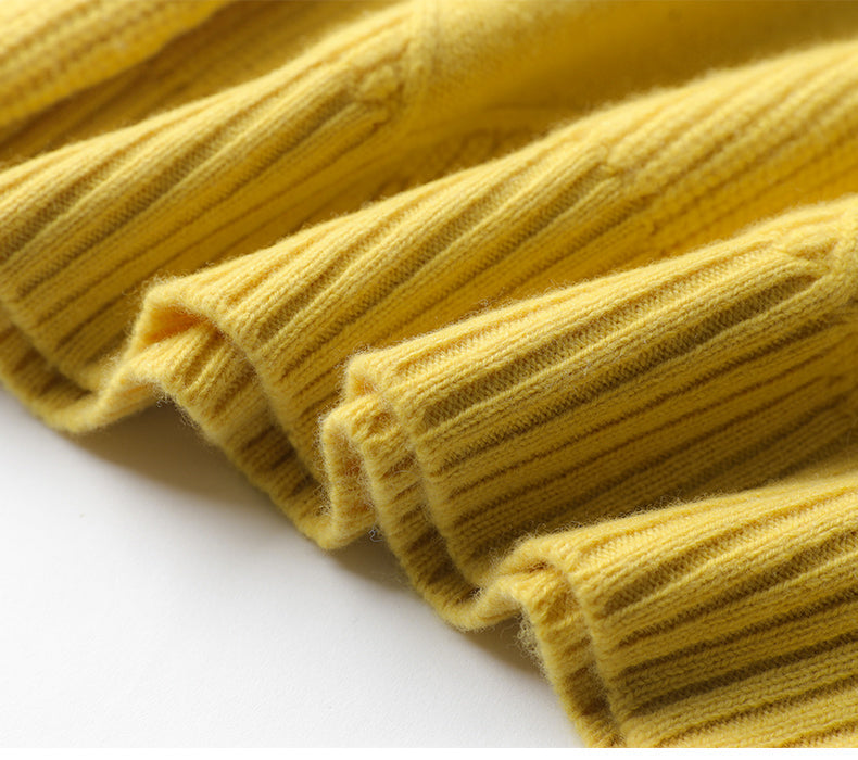 Warm high neck sweater for women, featuring a distinct geometric texture and cozy feel.